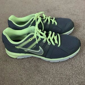Grey Nike running shoes